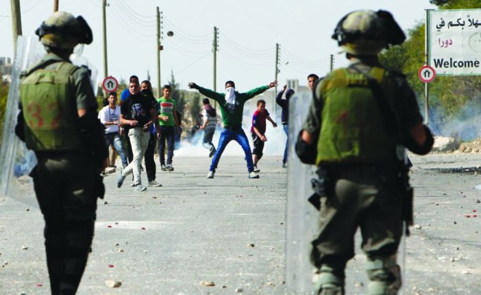 palestinian killed in rioting near chevron