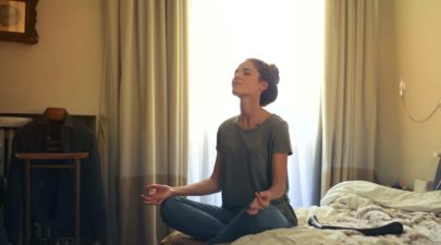 woman meditating in bedroom 3772612