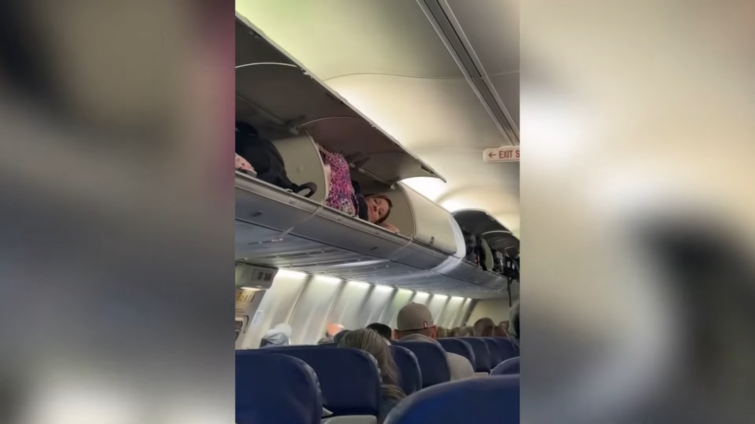 Southwest passengers baffled after woman climbs into overhead bin for nap 0 42 screenshot